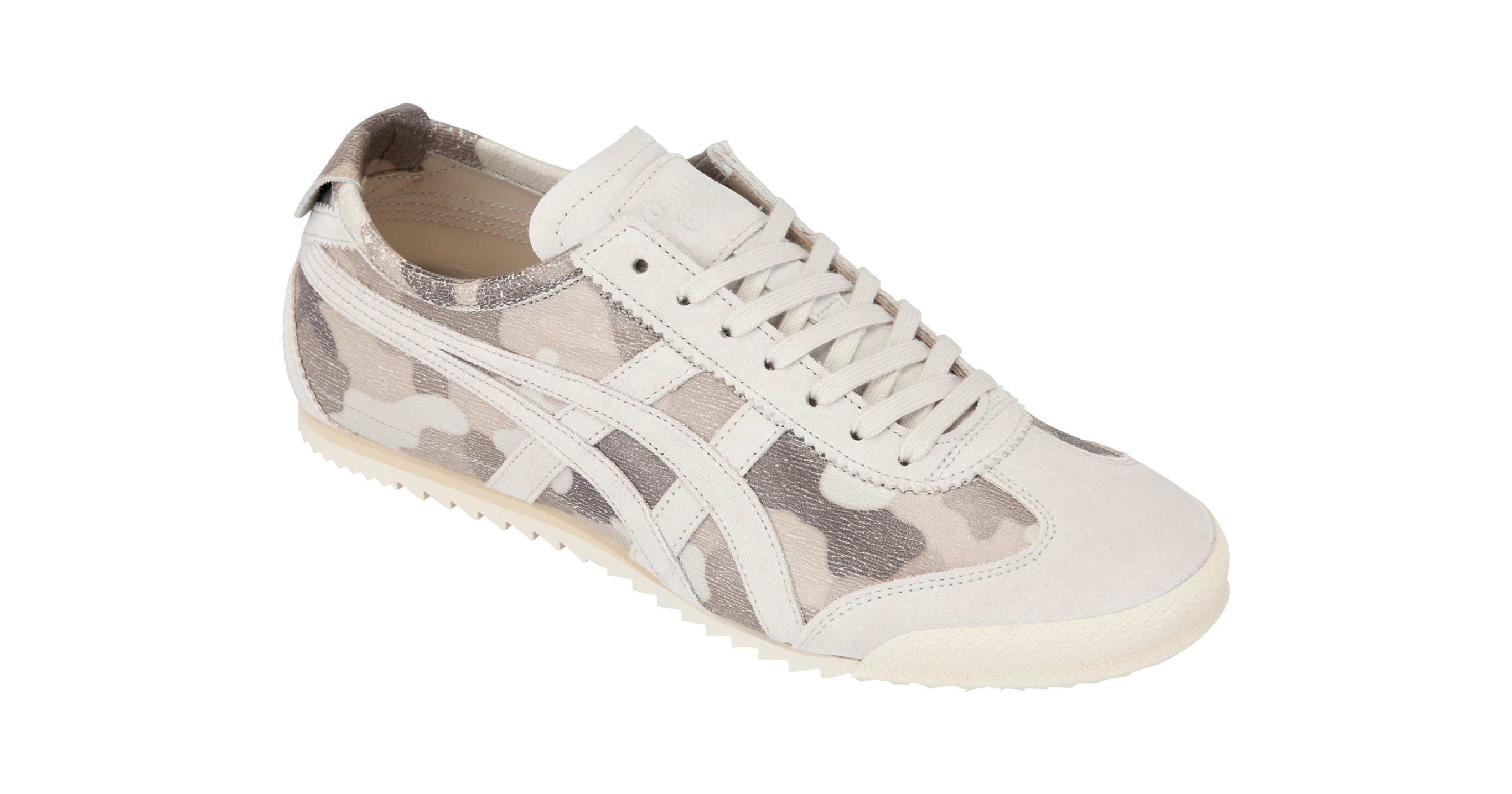  In August, Onitsuka Tiger will be releasing “MEXICO SLIP-ON DELUXE” for their “NIPPON MADE” series. The footwear has an elastic strap applied on its instep to provide a comfortable fit. The upper material of the sneaker is leather made in Japan. The sneaker comes in camouflage pattern. WHITE/WHITE 25,920 Yen (Tax Included)
